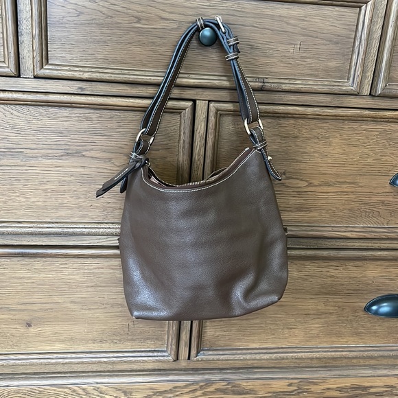 Dooney and Bourke. Brown leather shoulder bag. Has interior stains. - Picture 2 of 14